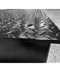 Close-up of textured steel surface of Built Tough As Nails Digital Industrial Floor Scale With 20000 Pound Capacity.