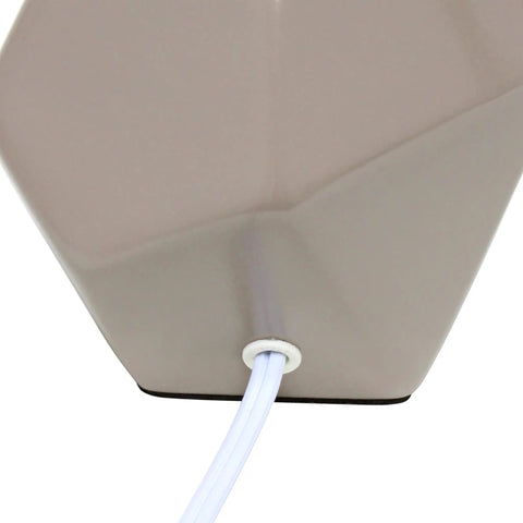 Close-up of Round Prism Mini Table Lamp with Matching Fabric Shade Black Ceramic Base Compact Desk Light with cord exit view.