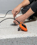 Hand using Replacement 5.5 mm 4.9 Foot Armored Waterproof Inspection Snake With LEDs For Plumbers Borescope Cat No ET18 in drain
