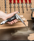 Person using High Flow Air Blow Gun With Three Piece Pneumatic Nozzle Kit For Dust Debris And Wet Spills, Pro Grade Shop Essential For Any Air Compressor, Quarter Inch Fittings, Easy Clean Up on workbench