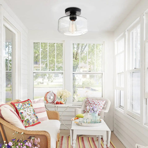 Industrial Semi Flush Mount Ceiling Light With Clear Glass Pendant Shade in a cozy sunlit room with farmhouse decor.