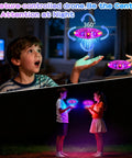 Boy playing with Hand Operated UFO Drone For Kids Aerial Flying Ball With Gesture Control And 360 Flip indoors, purple glowing