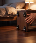 12pcs Black 360 Degree Swivel Casters for Furniture and Storage on a wooden nightstand, showing silent operation and swivel design.