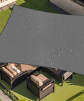 Waterproof Sun Shade Sail 8 By 10 Foot Dark Grey Canopy With Curved Edges, 95 Percent UV Blocking, installed over outdoor seating