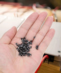 Top Shelf Rectifier Diode 100 Piece Assortment Kit showing black semiconductor modules in hand for AC to DC conversion.