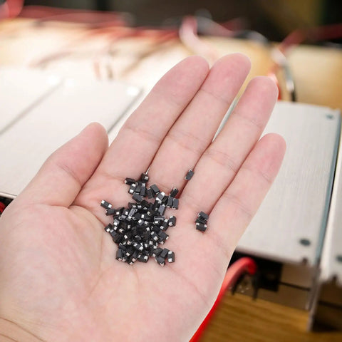 Top Shelf Rectifier Diode 100 Piece Assortment Kit showing black semiconductor modules in hand for AC to DC conversion.