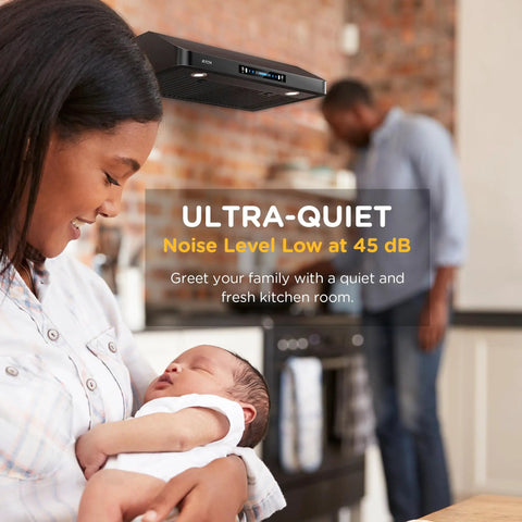 Mother with baby in kitchen showing 36 Inch Under Cabinet Range Hood With 900 CFM Dual Motors Black Kitchen Vent Hood for quiet cooking