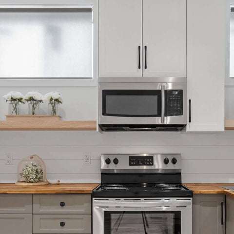 Badass Matte Black Cabinet Handles 5 Inch 128mm Kitchen Drawer Pulls on modern kitchen cabinetry with stainless steel appliances.