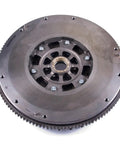 High Performance Dual Mass Clutch Flywheel Fits 2007 To 2020 Nissan 350Z 370Z G35 G37 Q60 Infiniti 35 Liter V6 view from front with bolts.