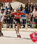 Inline skaters racing on road, featuring Red Magic Hardcore 2.0 Inline Speed Wheel For Road Skating 125mm Aluminum Hub X Firm Single Wheel.