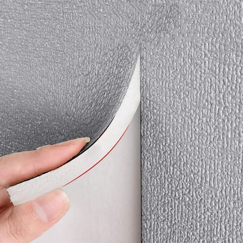 Thick Peel And Stick Foam Wall Panels With Heavy Duty Thermal Insulation and Double Sided Aluminum Foil being applied.
