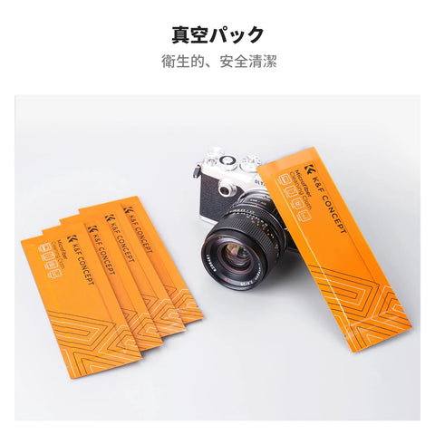 K&F Concept microfiber cleaning cloth packs, six orange packs beside a camera.