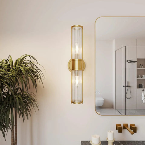 Gold Aluminum Wall Sconce With Cut Glass Shade, Up And Down Lighting beside bathroom mirror