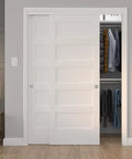 Richelieu Hardware 14660BC 60 Inch Bypass Door Hardware Kit With Zinc And Brass Finish installed in closet
