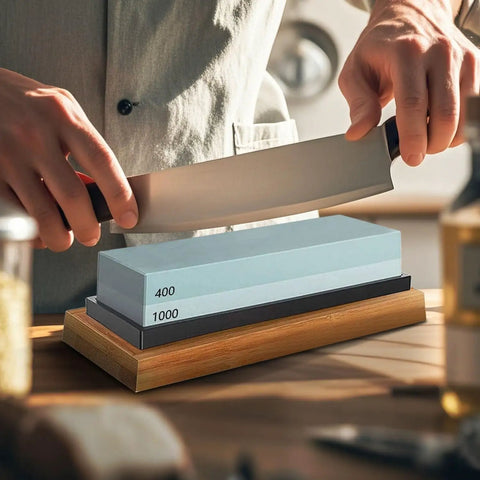 Using Go To Knife Sharpener Stone Set With Four Grit Waterstones 400 1000 3000 8000 Non Slip Bamboo Base on a kitchen knife.