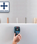Road Ready 5 In 1 Wall Scanner And Electronic Stud Sensor held up against a wall locating wood, metal, and AC wires.