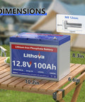 12V 100Ah LiFePO4 Battery With 100A BMS, 1280Wh, Group 24 Size, shown with dimensions on wooden table.