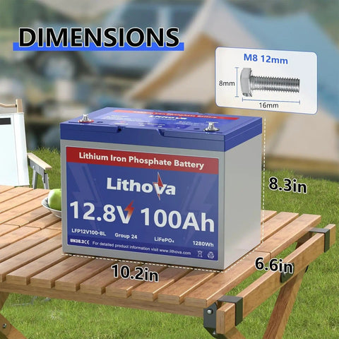 12V 100Ah LiFePO4 Battery With 100A BMS, 1280Wh, Group 24 Size, shown with dimensions on wooden table.
