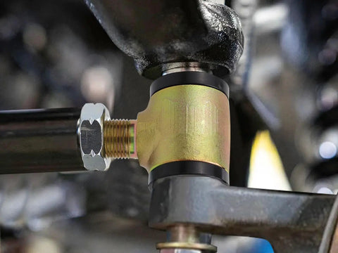 Three-Quarter Inch Threaded Bushing Kit for Four-Link Suspension and Replacing Worn Rod Ends and Suspension Bushings, close-up view.