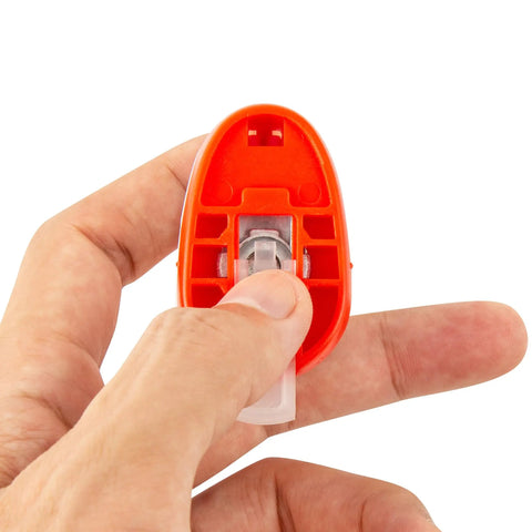Red circle paper puncher from Must Have Circle Paper Punch Set Three Piece Mini Hole Punchers In 3mm 6mm 9mm Circle Cutters held in hand