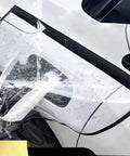 Solid Magnetic EV Charger Port Cap For Cadillac Lyriq 2023 To 2026 waterproof armor shielding outlet from water, shown in use.