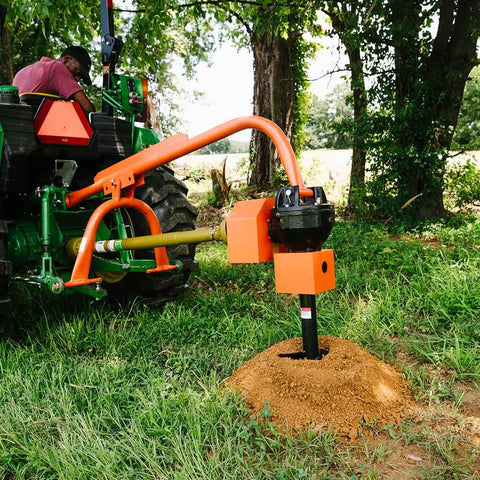 60 HP Three-Point Post Hole Digger With Nine Inch Auger Attachment For Cat 1 Tractors in use with robust rear mounted tubular frame