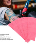Disposable Pen Covers Set 200 Pieces Protective Sleeves For Cartridges And Machines displayed in tattoo setting