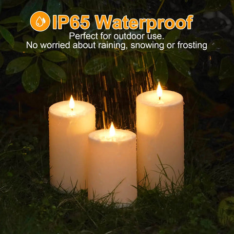 Solar Candles Outdoor Waterproof Flameless Pillar LED Lights Set Of 3 Dusk Till Dawn Auto On Off in garden during rain.