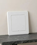 Straight Up White Abs Access Panel Cover For Ceiling Maintenance And No Sweat Pipe Concealing Universal Drywall Patch Seamless Drain Tube Shield Smooth Indoor Plumbing Solution on a wall