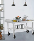 Stainless Steel Equipment Stand 30 By 36 Inches with Under Shelf and Casters for Commercial Kitchens, shown in use.