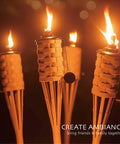 Bamboo Tiki Torches Outdoor Citronella Torches Weathered Color 4 Pack Large Patio Torches for Tropical Decor Lighting at night.