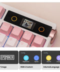Close-up of Full Size Mechanical Keyboard With Smart Screen And Media Knob For Rgb Backlit Gaming Setups featuring a touchscreen and pink keycaps.