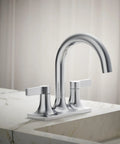Venza Centerset Bathroom Sink Faucet With Dual Levers, 3 Hole Mount, 1.2 GPM, polished chrome finish on marble countertop
