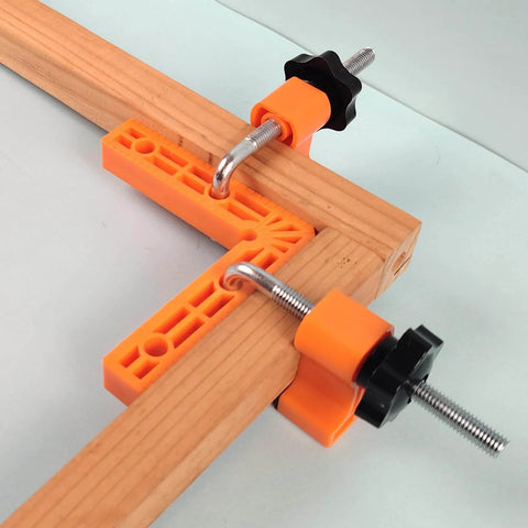 90 Degree Clamp Set With Positioning Squares Three Inch Four Inch And Two Point Three Inch Right Angle Clamp in use on wood