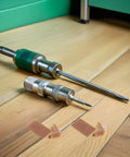 L Shaped Rectangle Drawer Glides Pins for Furniture Drawer Repair Made From Durable Plastic and Iron on wood floor