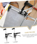 Close-up of Solid Grip Handheld Leveling Jack Pair Multi Purpose Tile Lifter And Cabinet Adjuster in use measuring tile alignment.