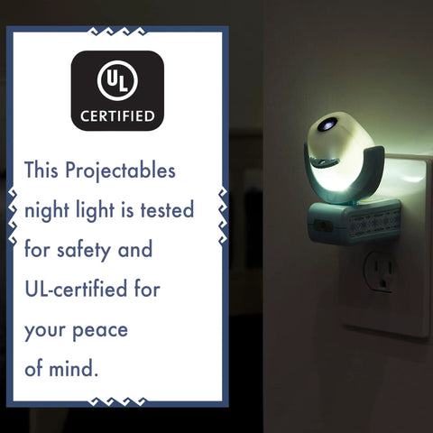 Disney Frozen 2 LED Projector Night Light With Plug In Dusk To Dawn Sensor showing safety certification on wall