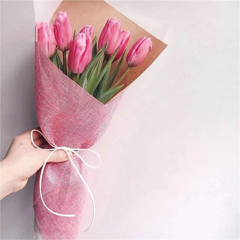 Pink tulip bouquet wrapped in Dope Bouquet Wrapping Paper 10 Yard Colored Linen Look Gift Wrap For Floral Arrangements.