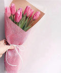 Bouquet wrapped in Brown Kraft Tissue Paper 10 Yard Linen Look Wrapping Paper White for floral bouquets and gift packaging.