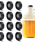 12 Pack 38mm Growler Caps With Durable Poly Seal Lids For Half Gallon And One Gallon Glass Jugs Replacement Tops For Homebrew Beer And Wine Making For Your Brew Scene Black next to filled glass jug