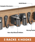 Close-up of a rustic wood broom holder wall mount with 5 racks and 4 hooks, featuring non-slip silicone rollers and solid wood construction.