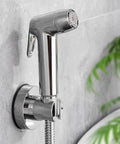 Wall-mounted handheld toilet bidet sprayer with 59 inch anti burst hose chrome finish flexible jet spray for personal hygiene.
