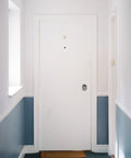 Heavy Duty Single Cylinder Deadbolt Lock With Slick Compact Ball Knob For Bedroom Doors on white door in hallway.