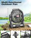 Portable Camping Fan With Led Lights And 20000mAh Battery on wooden table outdoors, showing 270 degree rotation feature.