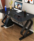 Game Ready Multifunctional Computer Desk With Built In Phone And Drink Slots Curved Gaming Table featuring a matte black surface and storage.