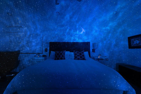 Bedroom illuminated by Galaxy Nebula Projector Light For Home Theater And Gaming Room With Led Starry Sky Multicolor Nebula Night Light Wifi App Control For Chill Relaxation Meditation Sleep Vibe Ambience