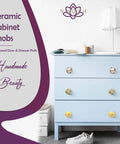 Fresh Ceramic Kitchen Cabinet Knobs And Dope Drawer Pulls For A Total Home Vibe Upgrade Pack Of Twelve ceramic knobs on blue dresser.