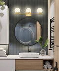 Brushed Brass 24 Inch Three Light Vanity Light With Modern Globe Glass Shades Damp Rated Wall Sconce For Over Mirror IP44 Bathroom Fixture Easy Mounting And Slick On Trend Contemporary Style