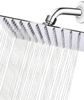 8 Inch Stainless Steel Rain Shower Head With High Flow Output, Square Rainfall Design, High Pressure Performance For An Epic Spa Like Shower, Chrome Finish, Durable Solid Metal Construction For Lasting Use spraying water.