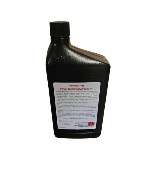Black bottle of 715 Power Steering And Hydraulic Oil, front label visible, 1 quart, high VI paraffinic base, anti-foam additive.